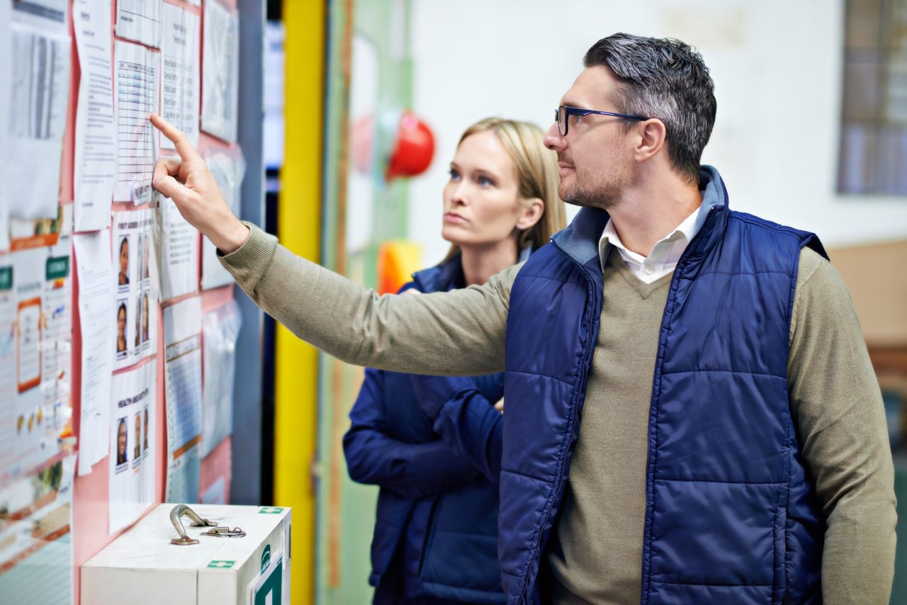 people-planning-checking-schedule-with-board-warehouse-with-calendar-order-details-man-woman-together-with-checklist-clipboard-supplier-information-inventory-updates-1280x854.jpg